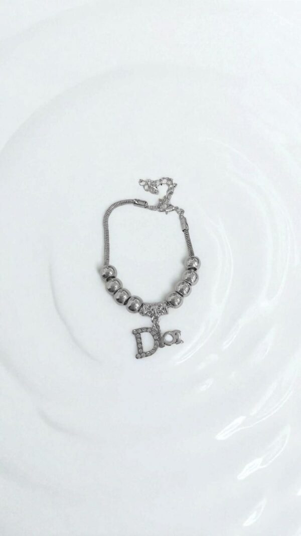 Браслет под Pandora с подвеской Dior арт.tr1804 серебро