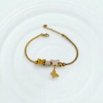 Браслет титан под Pandora с бабочками арт.tr1845 золото