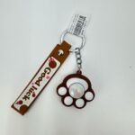 Брелок Лапка светящаяся 4см арт.666-34 коричневая