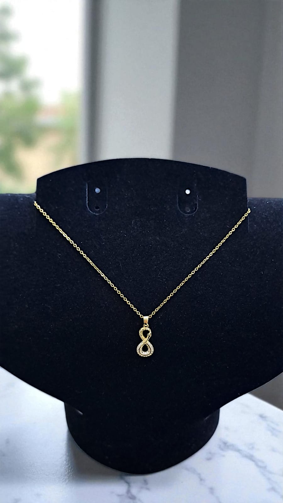 Кулон титан Змея в виде бесконечности арт.tr2128 золото Кулон титан Змея в виде бесконечности арт.tr2128 золото