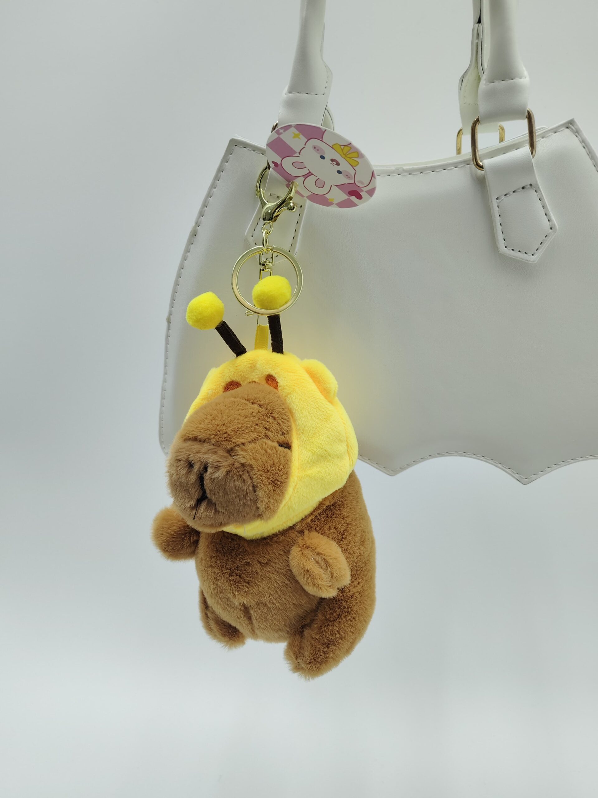 Брелок мягкий Капибара в капюшоне пчелки 10см арт.b38m желтый Брелок мягкий Капибара в капюшоне пчелки 10см арт.b38m желтый