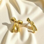 Серьги Бантики титан 2*2,5см арт.tr1775 золото