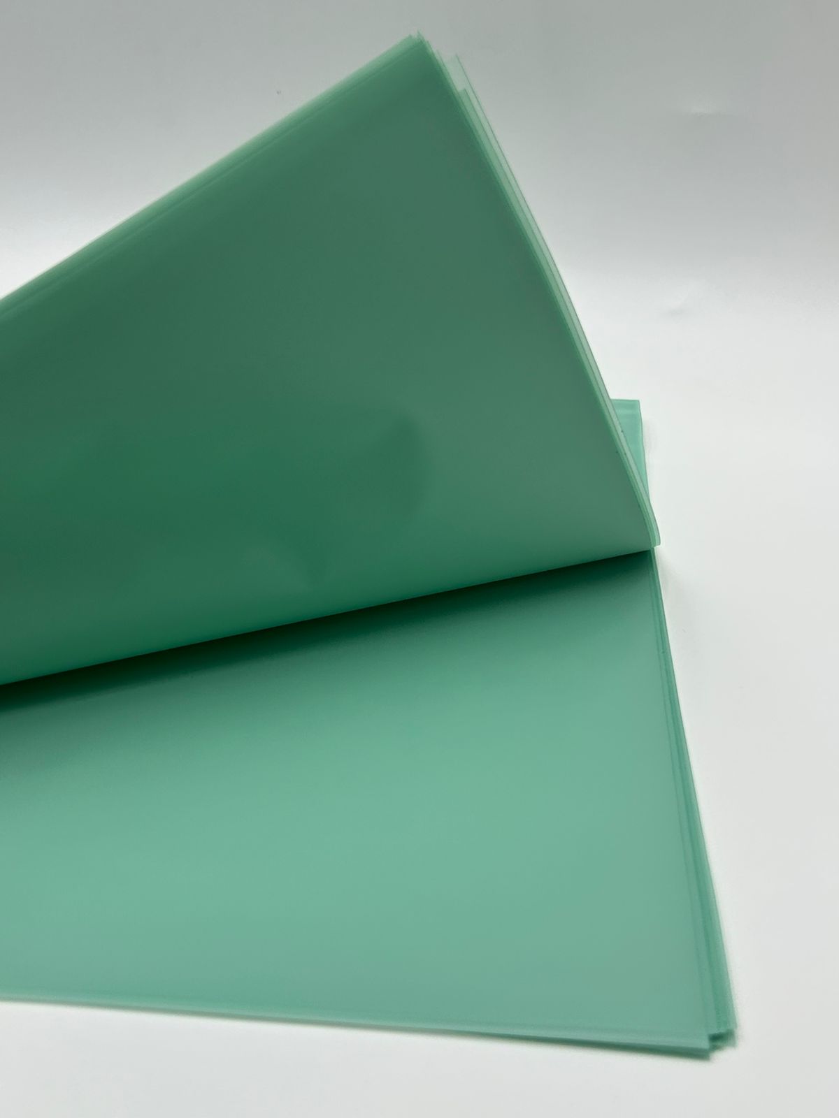 Пленка упаковочная 60*60см арт.tr567 бирюзовый Пленка упаковочная 60*60см арт.tr567 бирюзовый